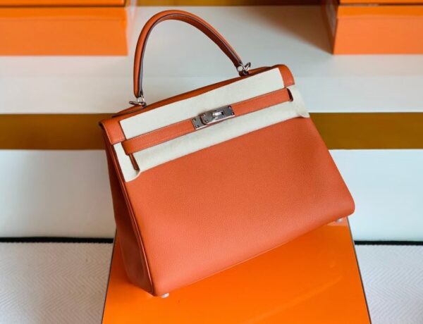 mmexport1676280647015-1024x785-1 Hermes Kelly Togo R1 Pumpkin orange Silver Hardware 32cm Full Handmade