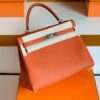 mmexport1676280647015-1024x785-2 Hermes Kelly Togo R1 Pumpkin orange Silver Hardware 32cm Full Handmade