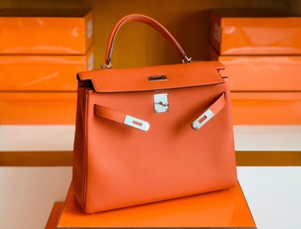 mmexport1676280654130-1024x779-1 Hermes Kelly Togo R1 Pumpkin orange Silver Hardware 32cm Full Handmade