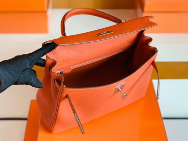 mmexport1676280657791-1024x768-1 Hermes Kelly Togo R1 Pumpkin orange Silver Hardware 32cm Full Handmade